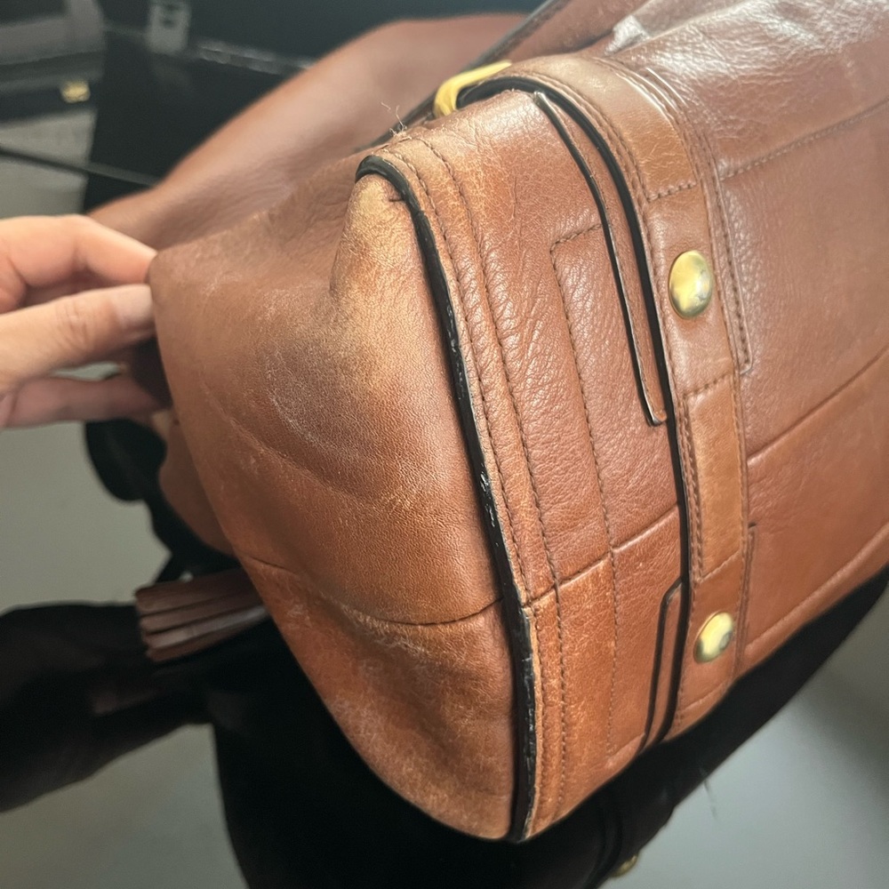 Coach Hampton Leather Carryall 15404
Brown Leather Handbag with Gold Accents - Picture 15 of 16